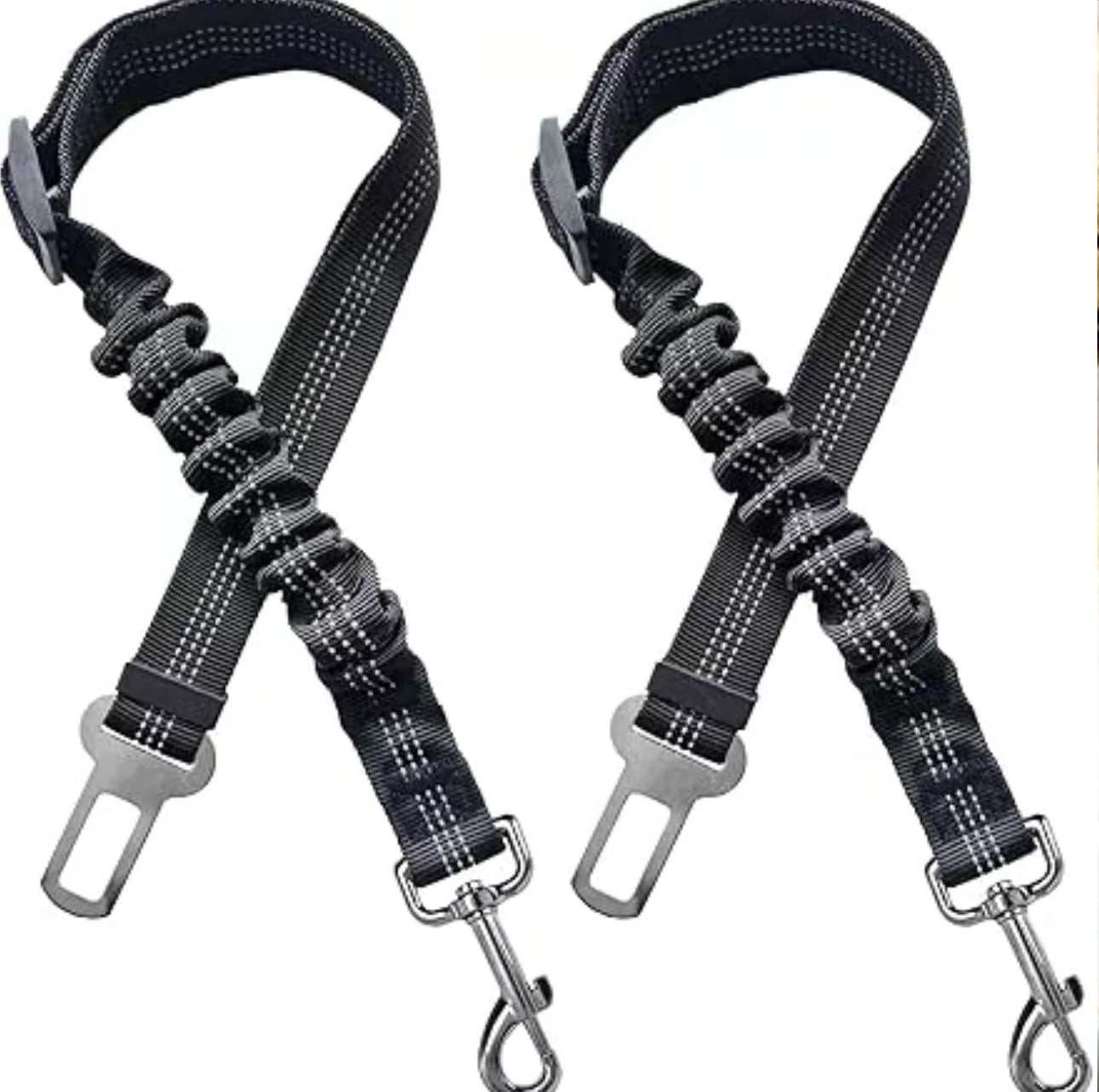 Two black and gray dog car seat belts on a white background