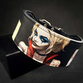 Leather wristband with a graphic design of a character on a black background